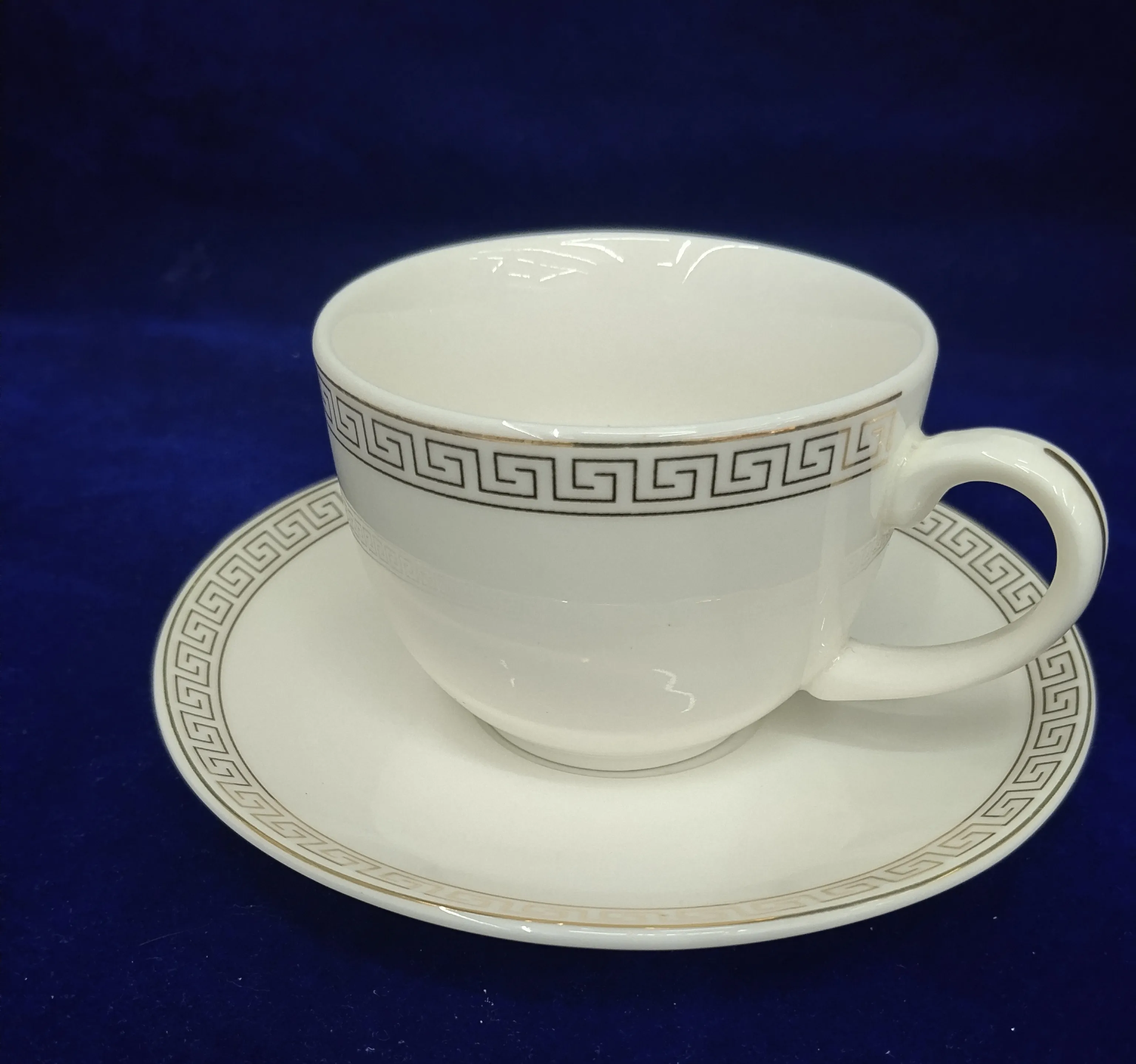 Porcelain Intricate Cup and Saucer view 2
