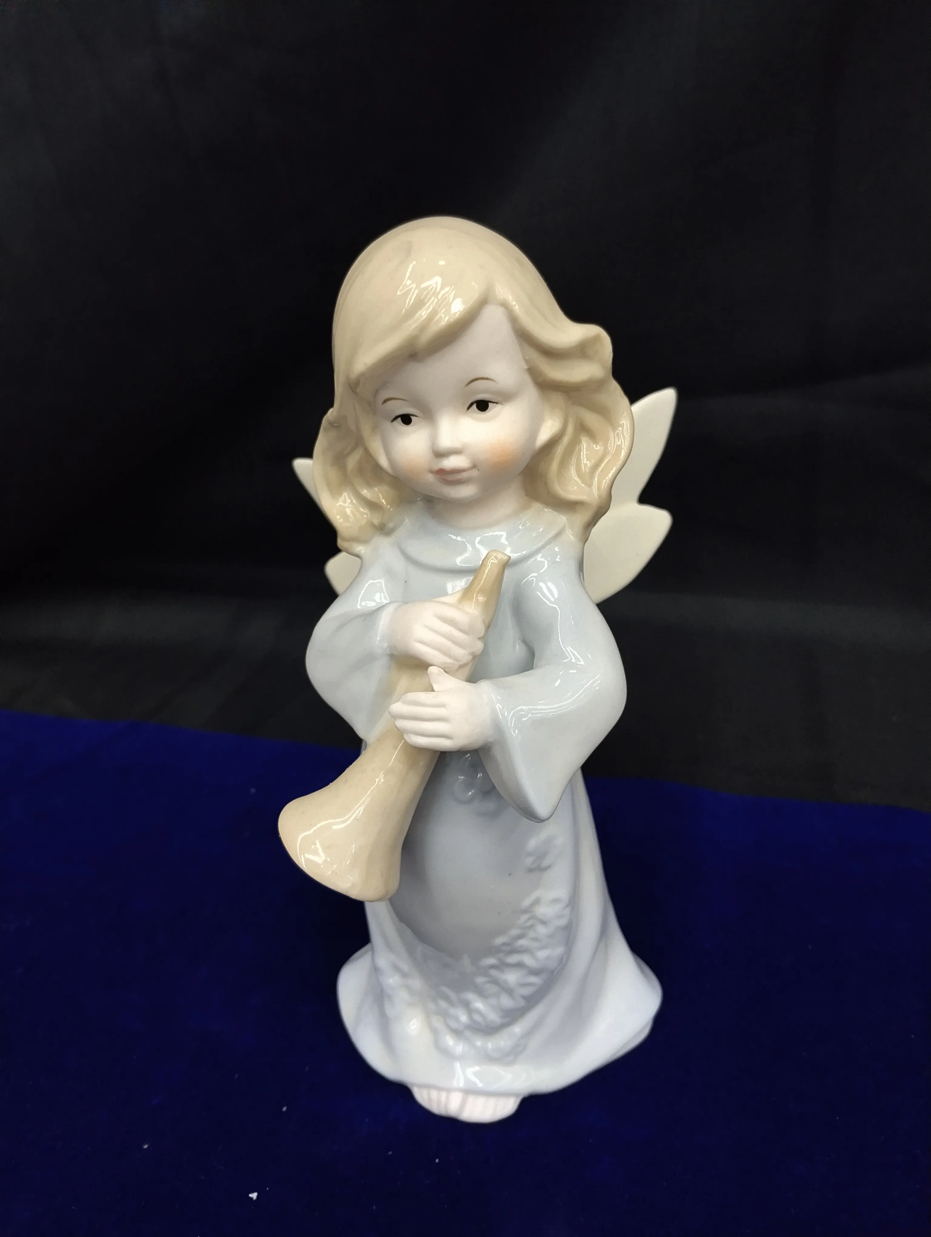 Angel Holding Trumpet view 2