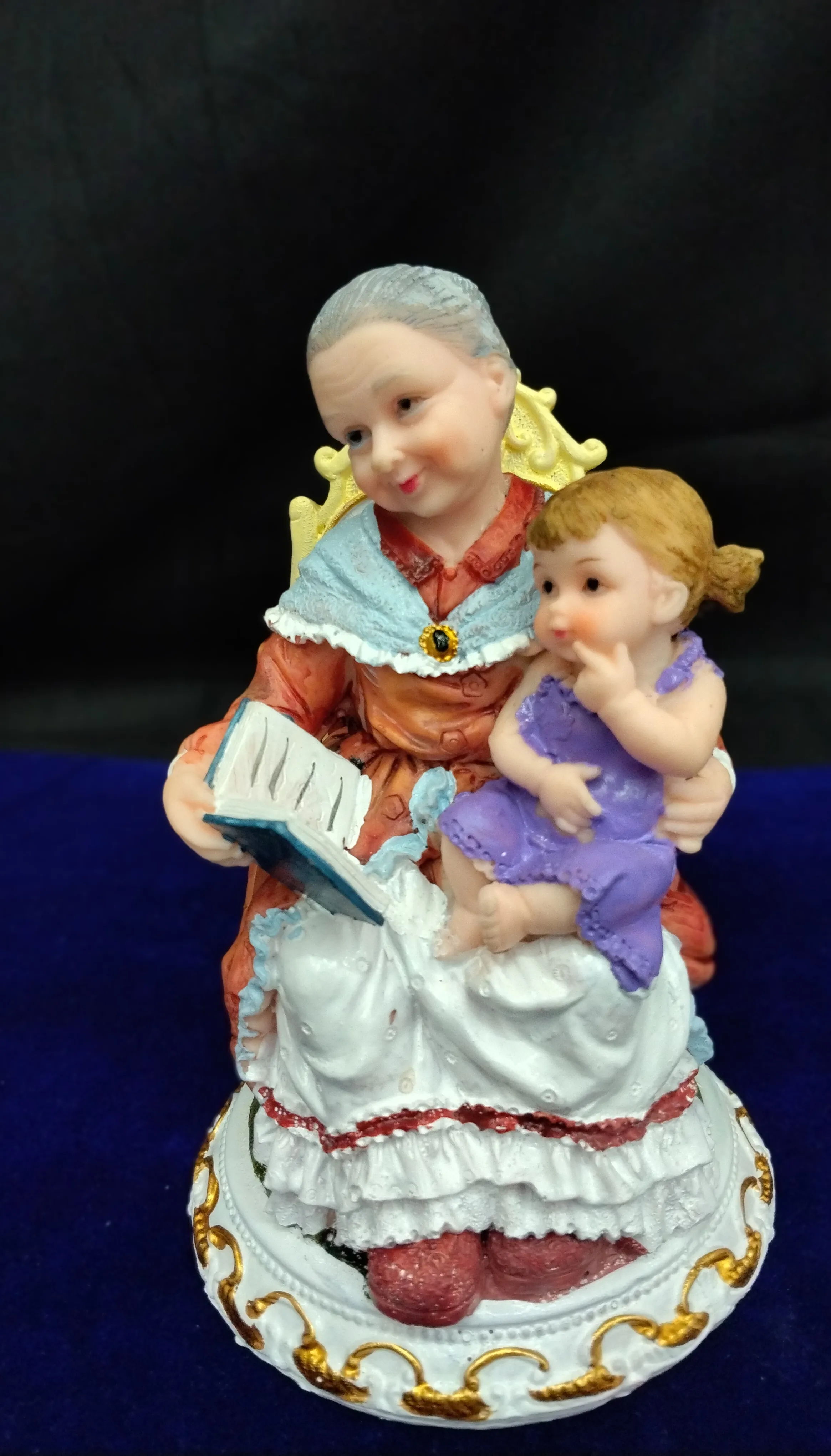 Grandmother and Child Figurine view 2