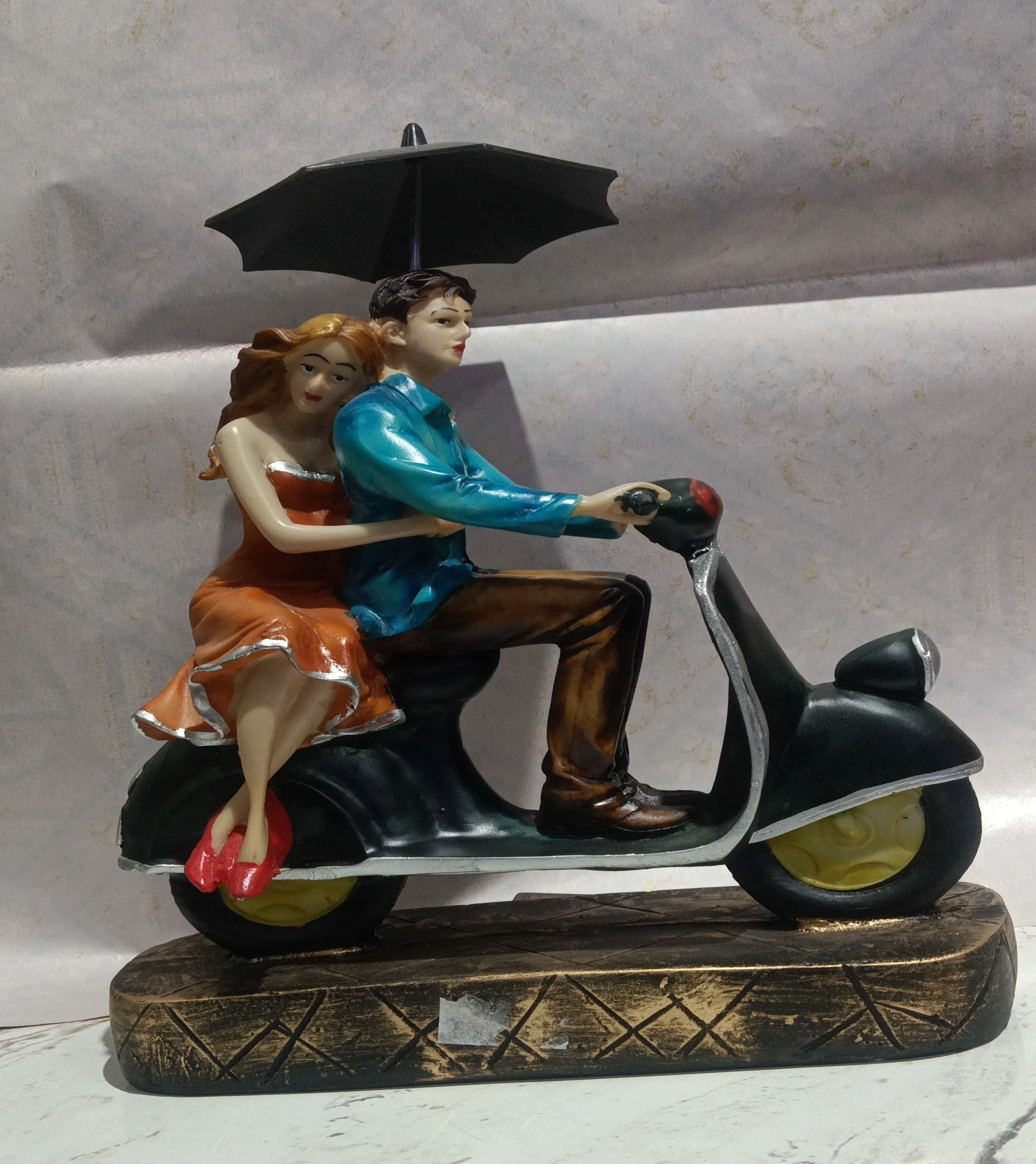 Couple on Scooter Figurine view 2