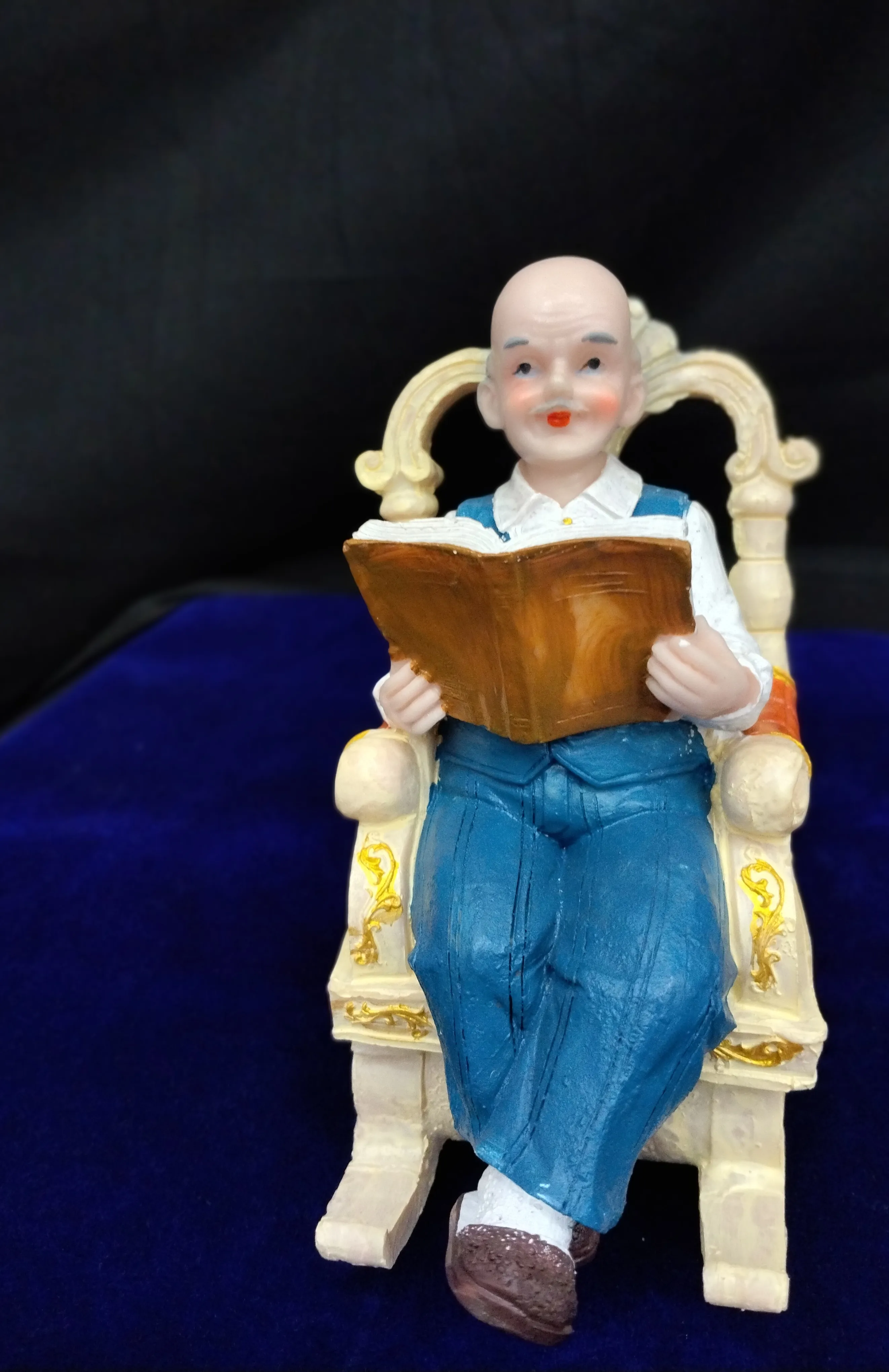 Reading Man Figurine view 2