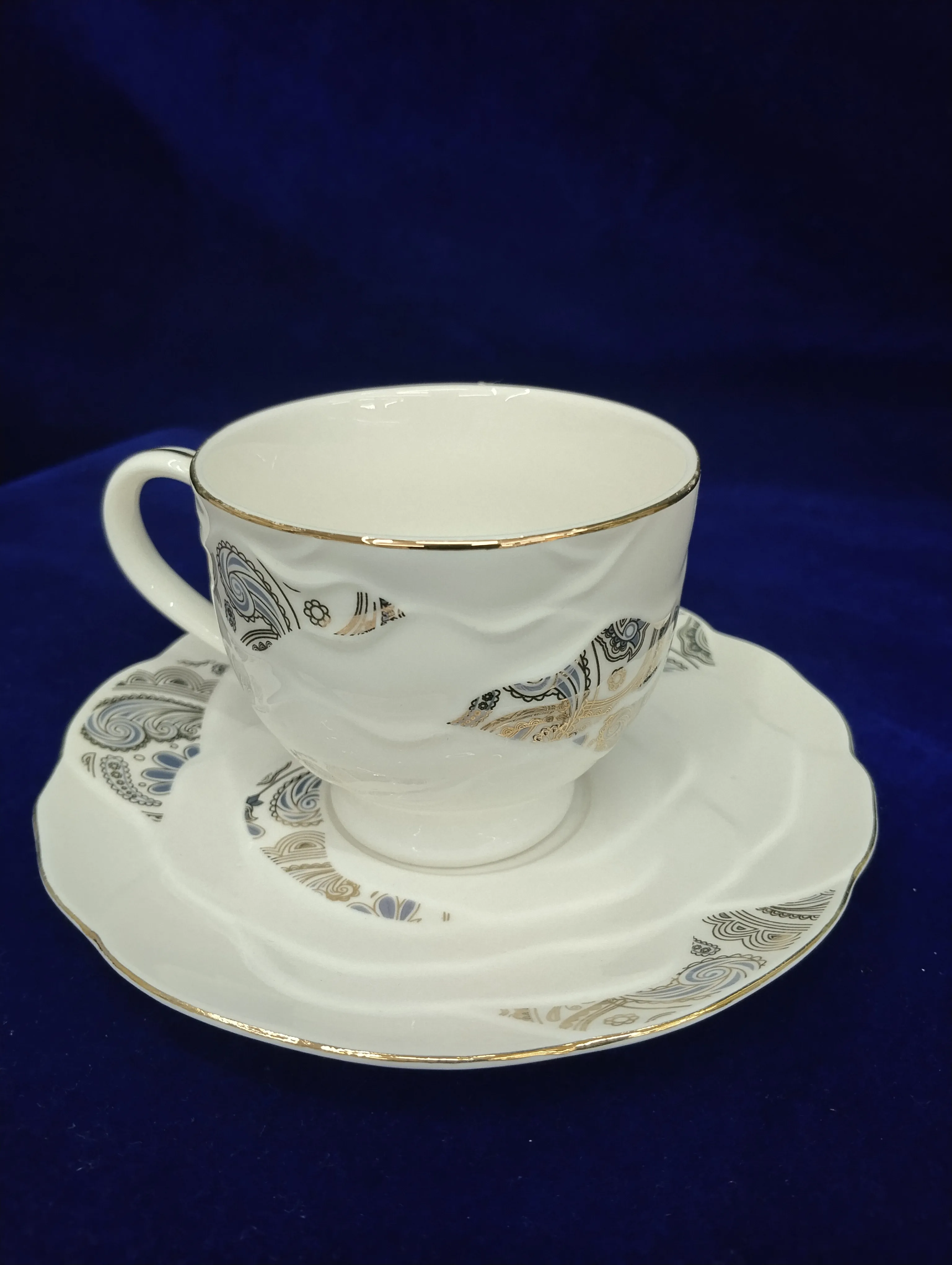 Exquisite Gold-Trimmed Teacup and Saucer view 2